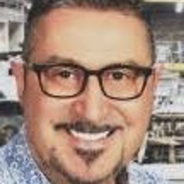 Ahmad Aboughoushe, Associate